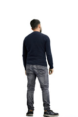 Naklejka premium A man, full-length, on a white background, thinks
