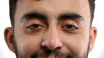 Obraz premium Man's eyes, close-up, on a white background