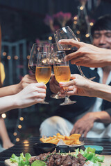 Toasting to Friendship: Hands clinking wine glasses filled with red and white wine, signifying...