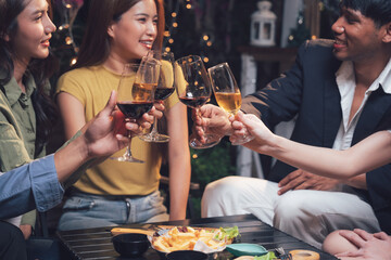Friends Toast: Capture the warmth and camaraderie of a gathering as friends raise their glasses in a toast, their smiles and laughter radiating good times and shared experiences.