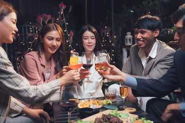 Cheers to Good Times: A group of friends raise their glasses in a toast, their laughter and camaraderie radiating warmth and joy. The scene is intimate and vibrant.