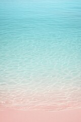 Clear turquoise waters gently meet soft sandy beach under bright sunlight