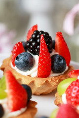 Cupcakes with fresh fruits for the party.