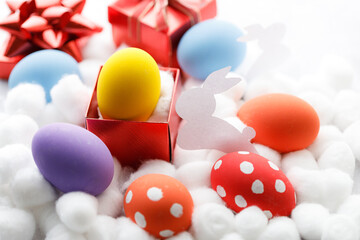 Happy Easter eggs and gift boxes on white background. Easter decoration.