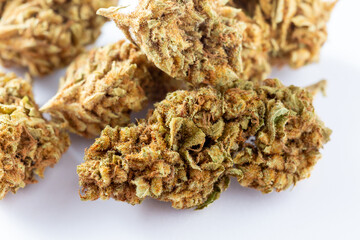Dried cannabis on white background