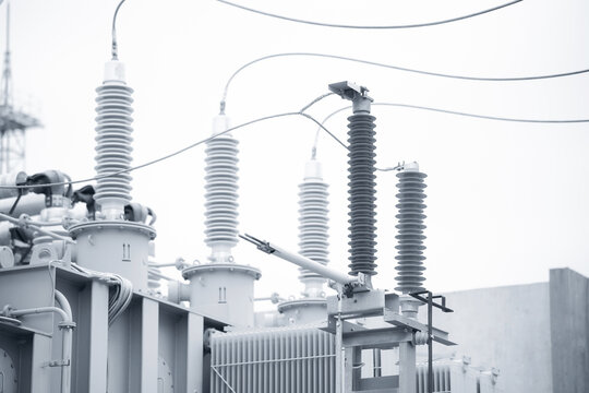 Electrical substation with high voltage switches, wires, transformer, ceramic insulators