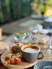 A cup of coffee cappuccino or latte on the table