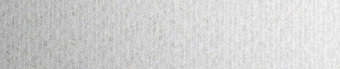 Subtle gray & white herringbone cotton textile, close up, upholstery