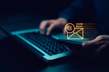 Businessman sending email by laptop computer to customer, business contact and communication, email icon, email marketing concept, send e-mail or newsletter, online working internet network.