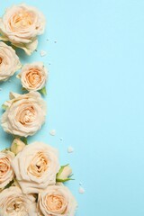 Beautiful composition with peony roses on color background