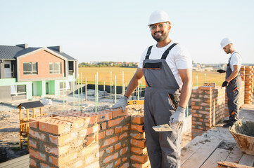 Group of indian workers at a construction site