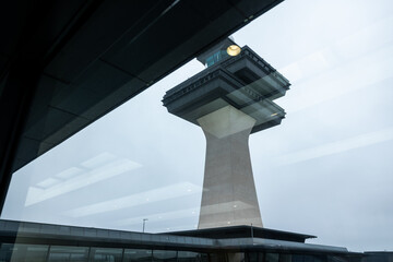 Airport control tower in Washington DC. Cloudy day