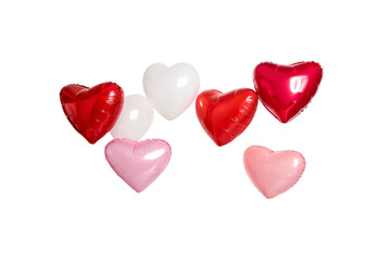 A cluster of heart-shaped balloons in red, white, and pink hues, floating gracefully against a black background, exuding vibrant romance and celebration, isolated on a transparent background