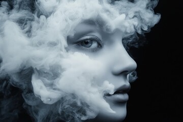 Fototapeta premium a woman's face surrounded by smoke, creating an ethereal and dreamy atmosphere.