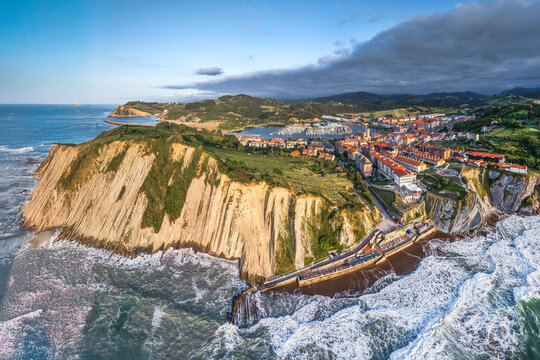 Aerial view of famous flysch of Zumaia and town in the background, Basque Country, Spain