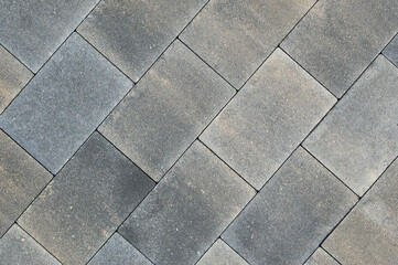 green yellow gray stone paving slabs close up