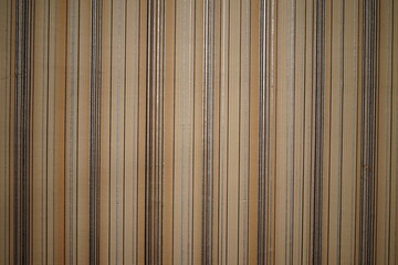 Obraz premium Elegant striped wallpaper in warm tones for home decor enhancement