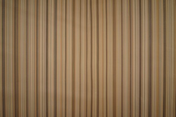 Obraz premium Vertical striped wall texture with warm colors and subtle variation