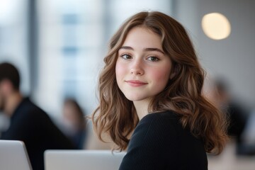 young woman working in an office setting