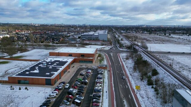 Solar Panels on Indoor swimming pool, winter. Fantastic aerial view flight drone