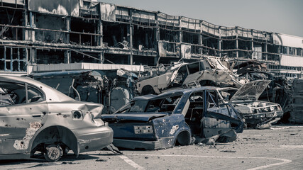 destroyed and burned cars in the city in Ukraine