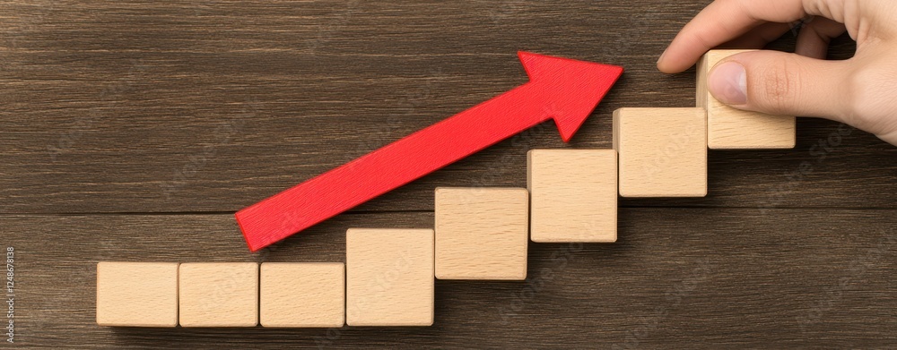 Poster Wooden Blocks Arranged in Ascending Order with Red Arrow Indicating Growth or Progress on Wooden Background