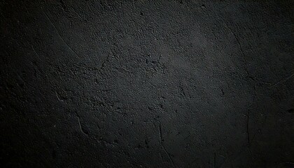 Obraz premium A captivating concrete texture background in shades of black, grey, and anthracite, perfect for use in wide panorama banners with a sophisticated vibe