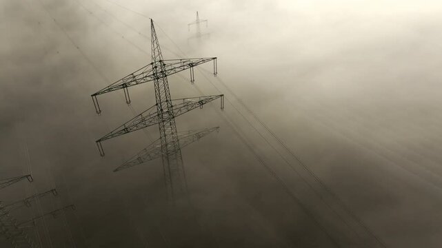 Utility pole aerial video with clouds and fog