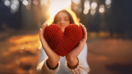 Fototapeta premium Woman holding red heart, valentines day heart