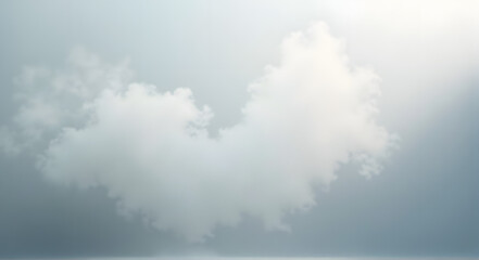 Soft white cloud formation in a clear blue sky creating peaceful atmosphere