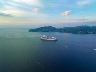 Phuket thailand Cruise ship in the sea,Aerial view of beautiful large white ship at sunset,Amazing landscape with big boats in patong bay Phuket Thailand