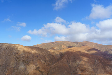 Scenic Mountain Landscape with Blue Sky and Clouds in Fuerteventura, Canary Islands