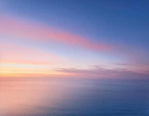 "Generate a dreamy sky-inspired minimalist gradient that flows between soft powder blue, warm peach, and gentle lavender, evoking the peaceful colors of a sunset or sunrise."