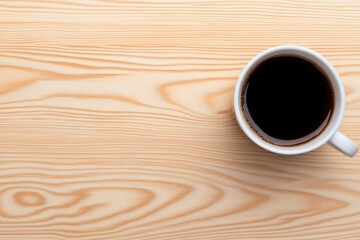 Obraz premium cup of coffee on wooden surface