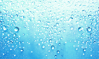 青い水と細かな炭酸泡のさわやかな背景