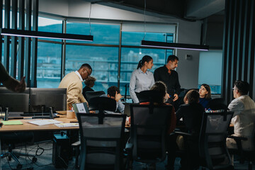 A diverse group of business people congregate around a table in a contemporary office, brainstorming creative ideas and showcasing teamwork and innovative thinking during a collaborative project