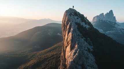 Obraz premium Faceless alpinist climbing up on cliff in Spain