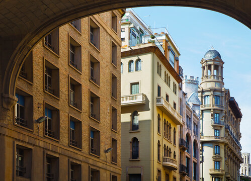 A row of business and apartment buildings on the edge of the Gothic Quarter in Barcelona, Spain.