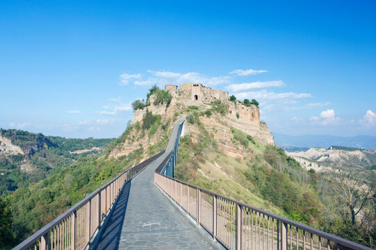 Bridge to the hilltop historic buildings of the fort of Civita di Bagnoregio, founded over 2,500 years ago, by the Etruscans.