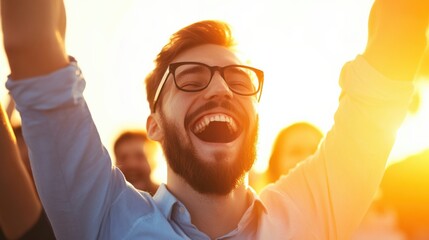 happy man celebrating success in sunlight