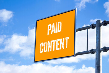 Paid content message written on billboard. Conceptual paid content symbol. Copy space.