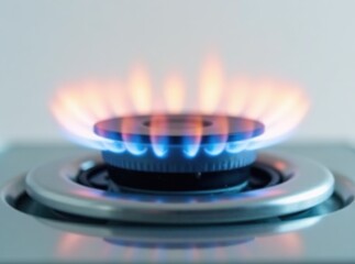 Closeup Lit Gas Burner Glass Plate - High Definition