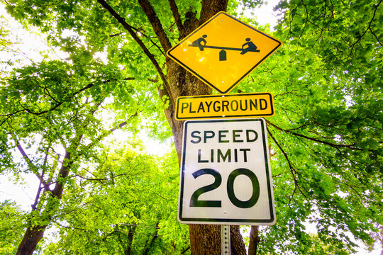 Street sign for a children's playground and speed limit, Spokane