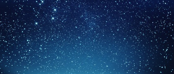Fototapeta premium A dazzling night sky adorned with countless sparkling stars, offering a mesmerizing spectacle of cosmic grandeur.