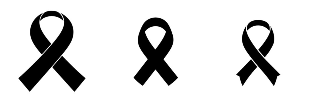 Black awareness ribbons of various sizes symbolizing remembrance and solidarity for important causes