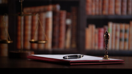Notary's public pen and stamp on a contract.