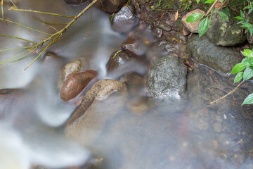 Río Paez or Paez River in Tierradentro, Inza, Cauca, Colombia. Long exposure shot. Water and rocks. Artistic and creative picture.