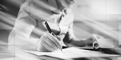 Senior businessman taking notes, light effect, geometric pattern