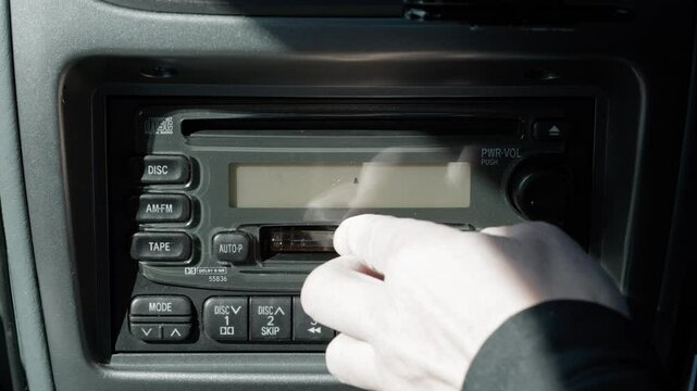 Insert a Cassette Tape into the Car Audio CD Cassette Radio Deck to Play Music  |  Japan