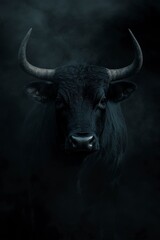 Naklejka premium Majestic Black Bull in Dark Atmospheric Setting with Smoke Effect